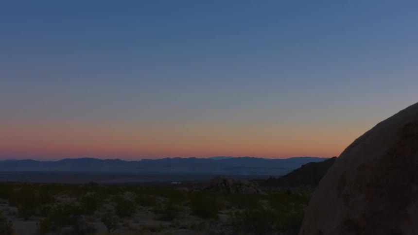 Sunrise on a horizon mountainous landscape in the desert
