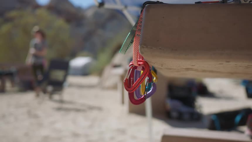 Colorful carbines hanging on a wooden ledge