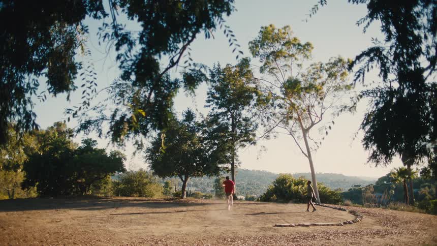 A clip of two male playing football