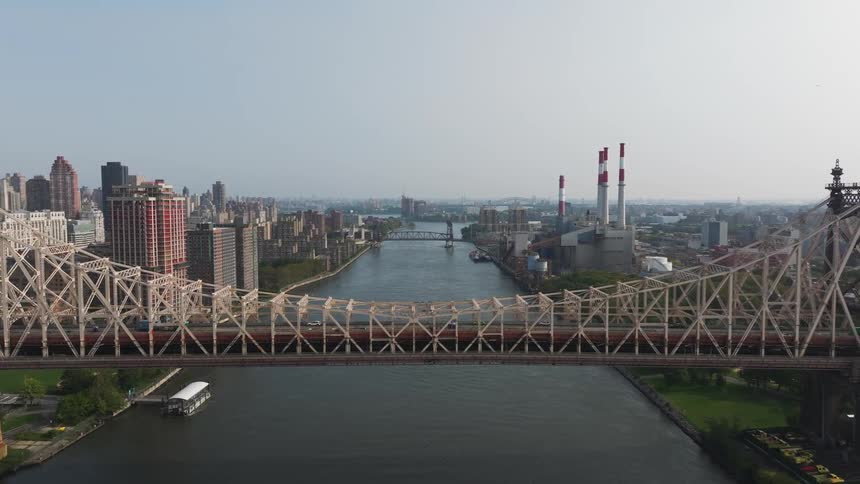 A city bridge over a river connects two parts of a city
