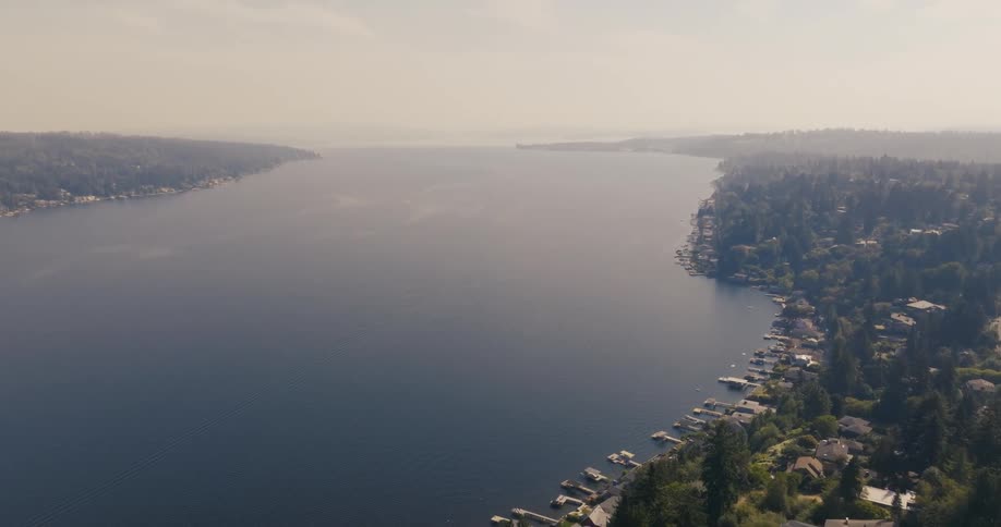 Thick wildfire smoke obscures the horizon above Lake Washington