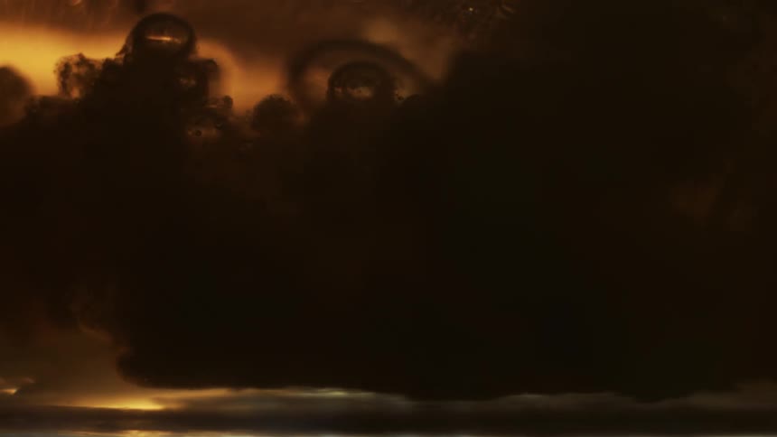 An underwater expansion of several small bubbles