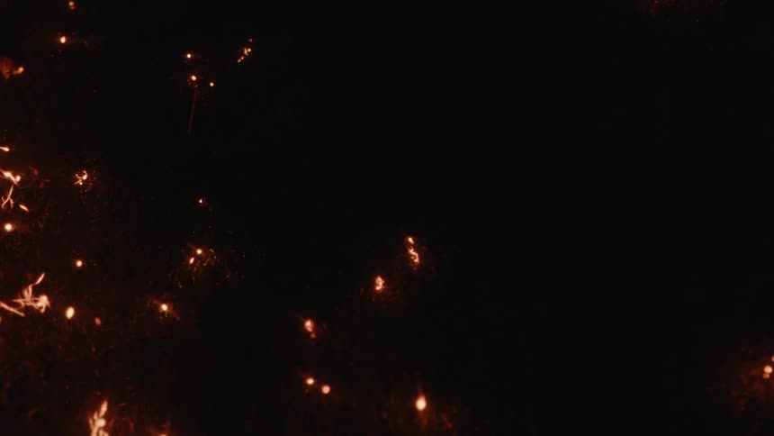 Sparks move around in the dark