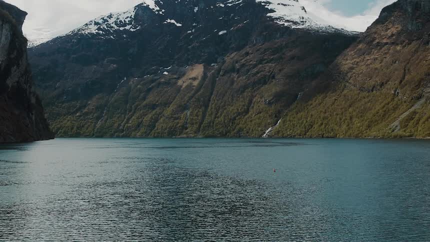 Turquoise water ripples on a mountain lake