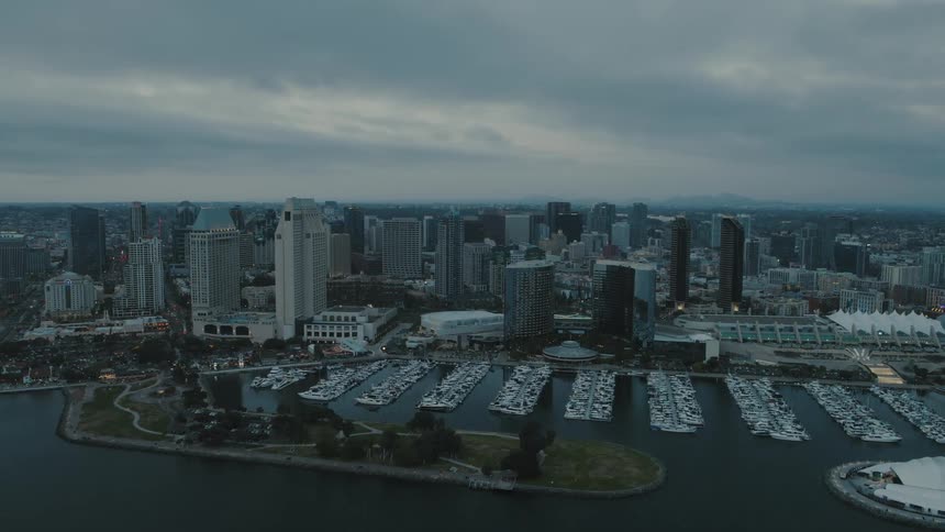 The camera orbits around the downtown San Diego waterfront and Embarcadero Marina at Blue Hour