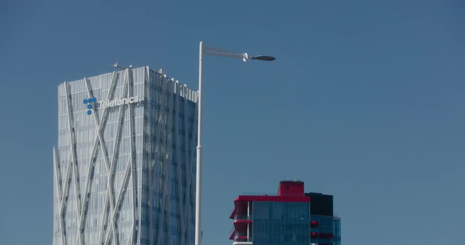 The tops of tall buildings in the city on a bright sunny day
