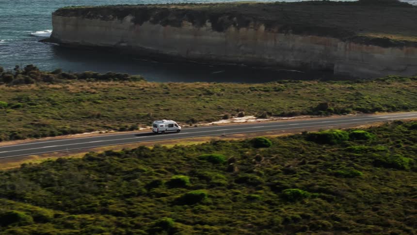 An aerial clip of a bus moving on the freeway