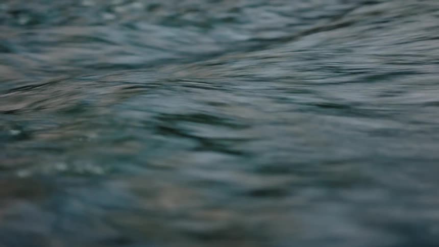 Close up of flowing river waters during the day