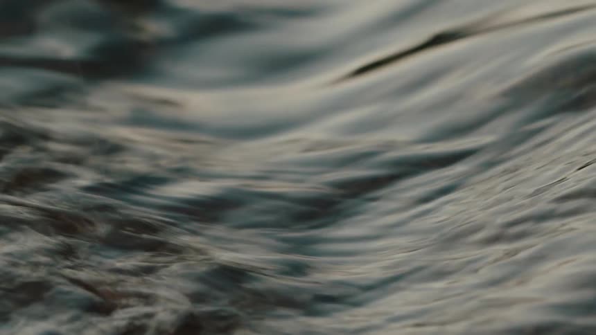 Close up of water flowing from a river