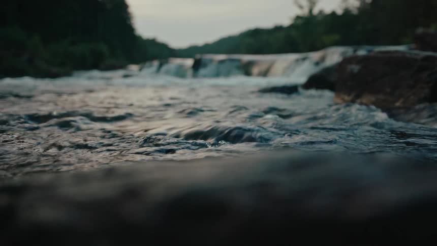 Waters of a river flowing in a morning