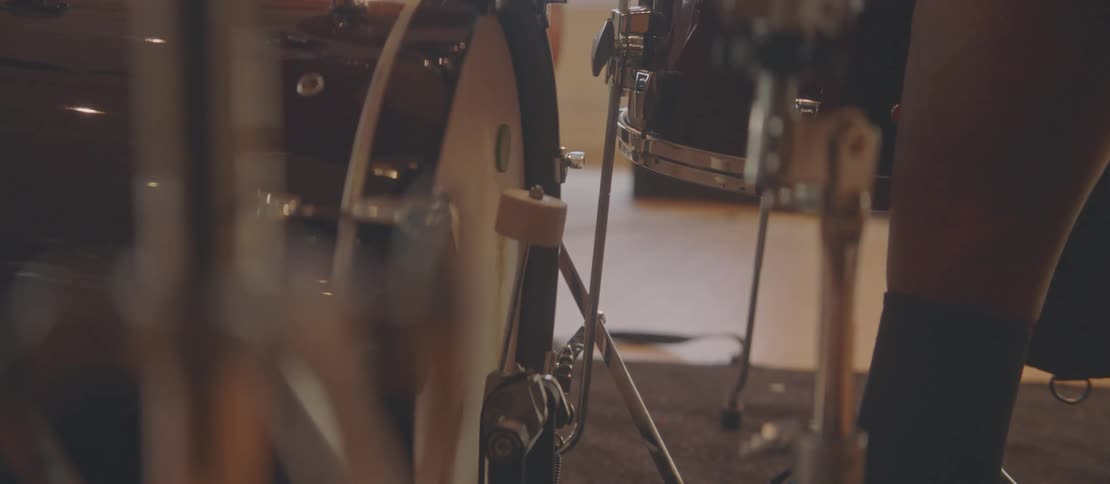 A clip of a person playing a drumset