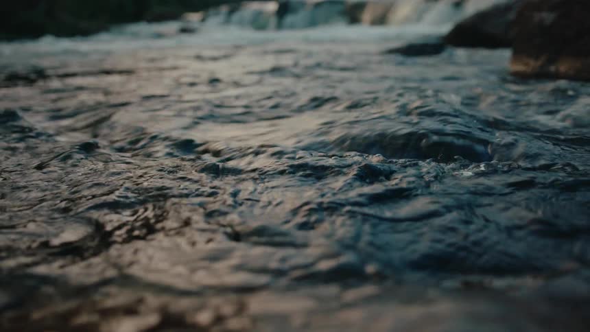 A river burbles as it runs over a rapid