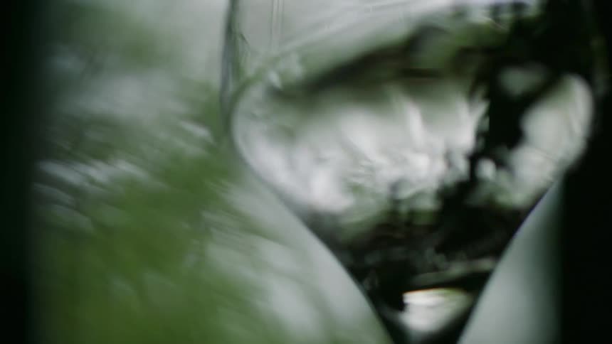 Close up of a glass wine glass with liquid swirling inside