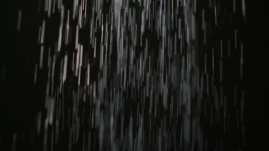 Falling water against a black background