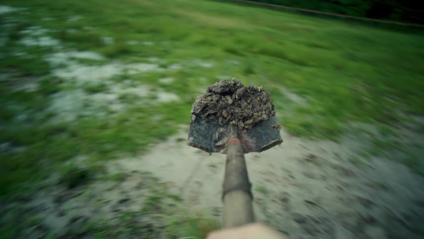A clip of a person working on a farm land