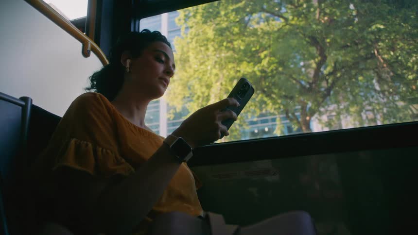 A clip of a female operating her phone