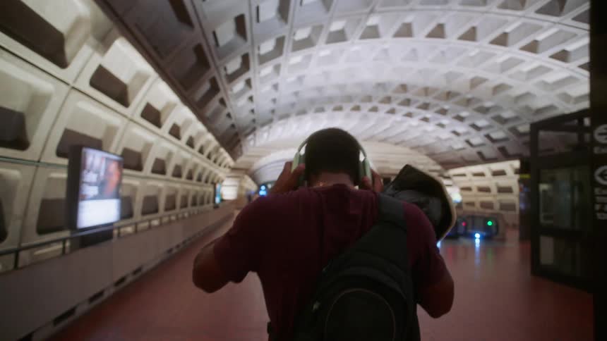 A clip of a male walking around the terminal