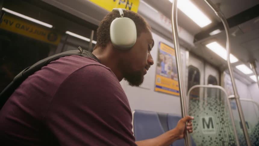 A clip of a person sitting in a train