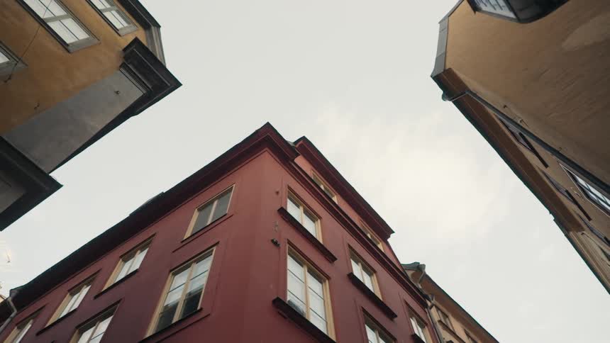 Suburban city buildings sit together at an intersection