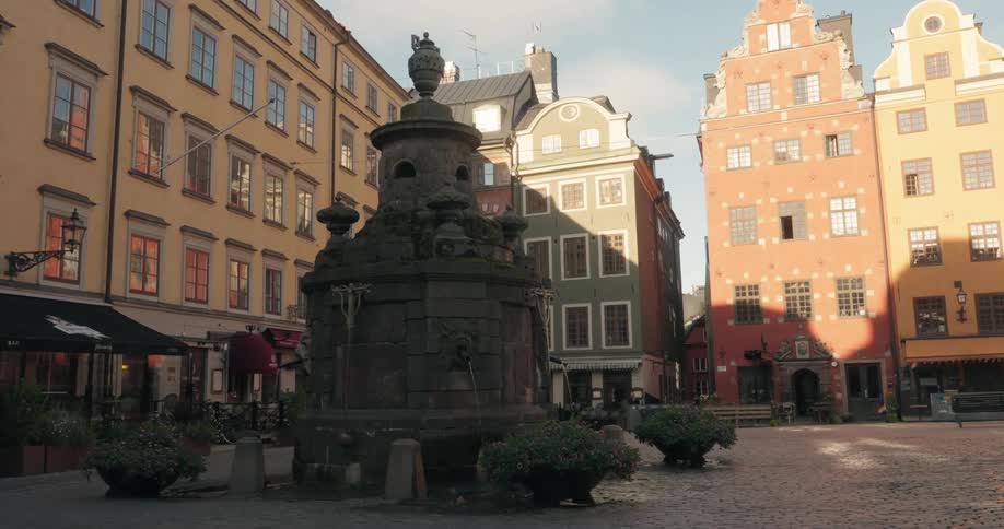 A structure is in the middle of the buildings