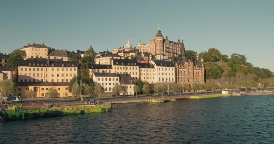 A city sits next to a body of water
