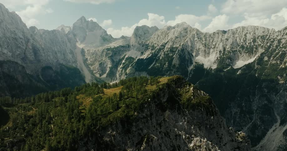 Aerial panorama of a mountain valley on a partly cloudy day