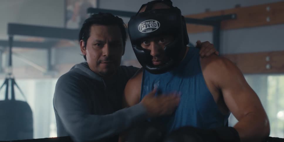 Coach motivating his boxer