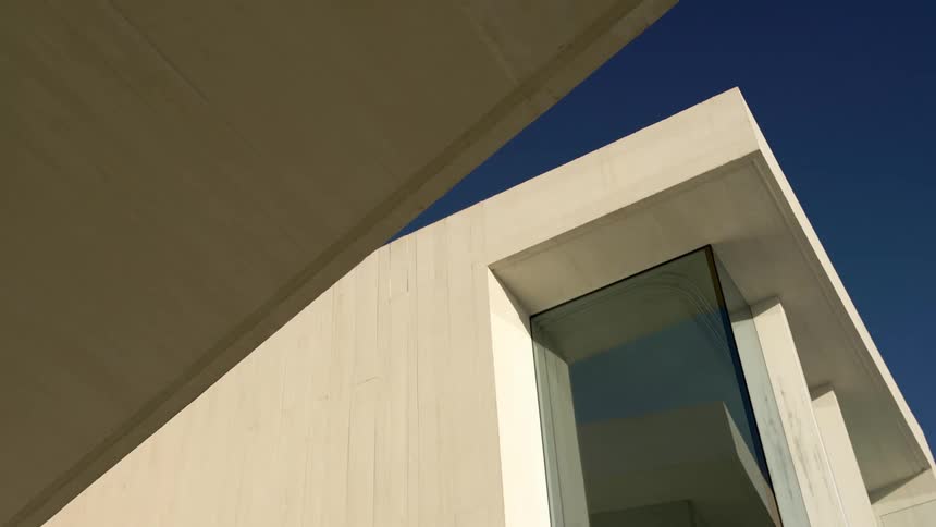Exterior architecture of a modern house with a reflective window