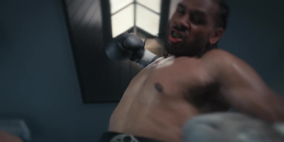 Point of view of a male boxer punching angrily