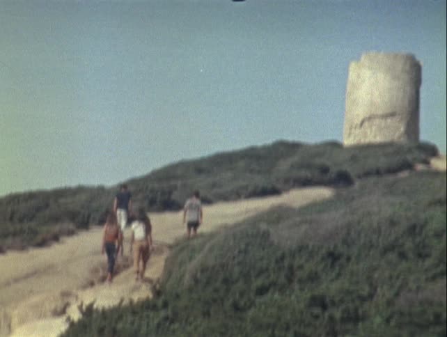 People climb up the hill together