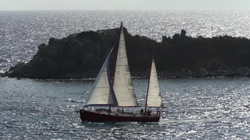 Sailing boat moving through the sea