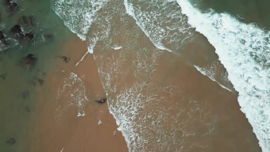 Aerial view of a turquoise blue sea