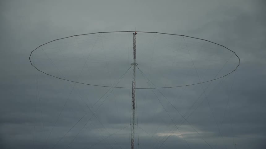 Large antenna with high tension strings view on a cloudy day