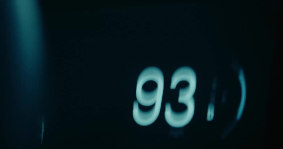 A closeup of a digital speedometer display
