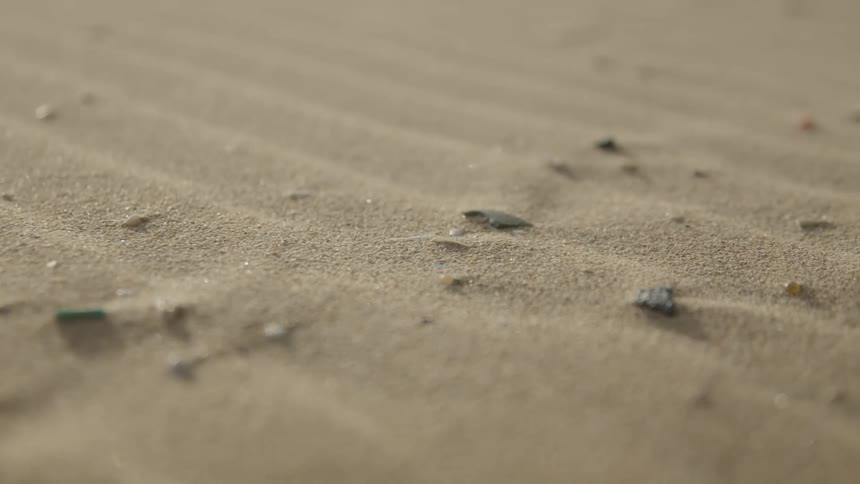 Close up of small stones in the sand