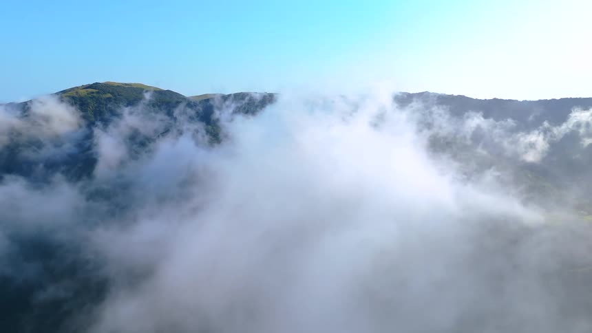 Aerial landscape of mountains at low cloud level
