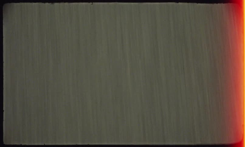 A concrete floor seen from above and passing quickly
