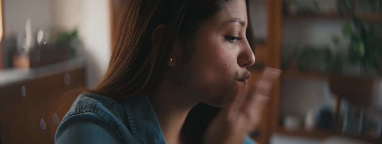 Portrait of a woman talking on a video call on her smartphone