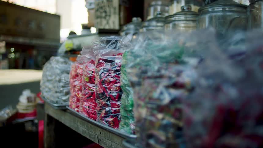 Jars selling packaged sweets in a store