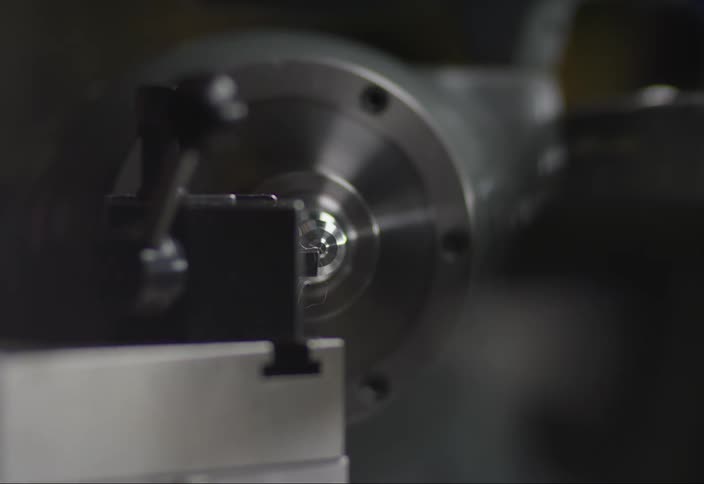 Closeup of a machine scraping a metal object