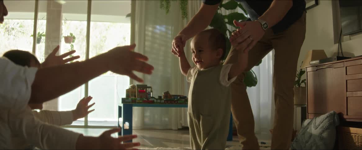 A clip of parents playing with their kids