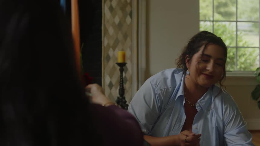 A woman puts food on the table