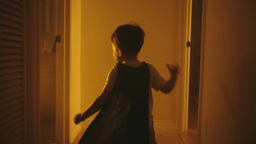 A clip of a kid running and playing