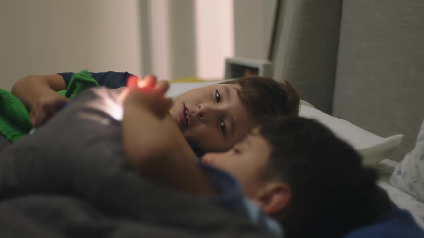 A clip of brothers getting ready for a night sleep