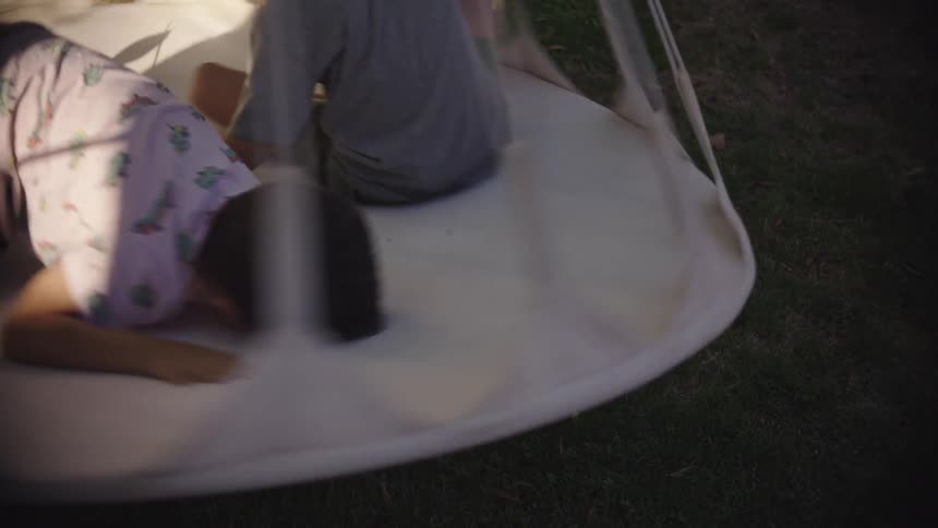 A clip of children playing outside the house