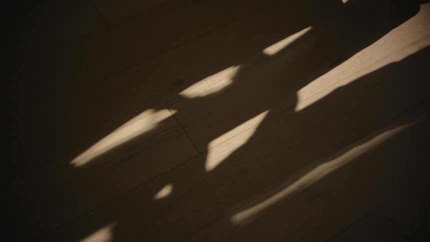 Shadow of two children with one of them running