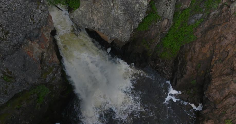Aerial view of a waterfall with a strong water fall