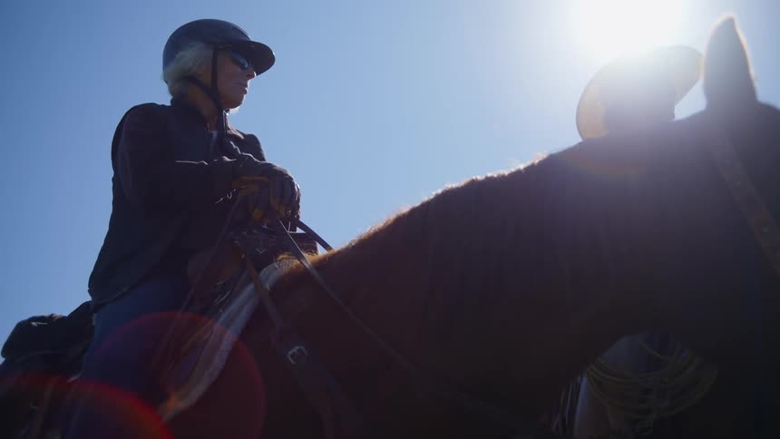 A clip of a lady on a horse