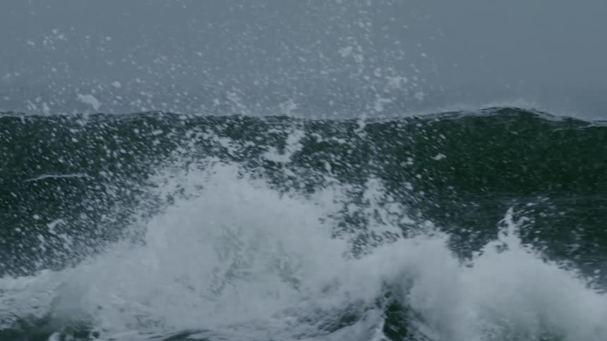 Storm sea waves crashing on shore