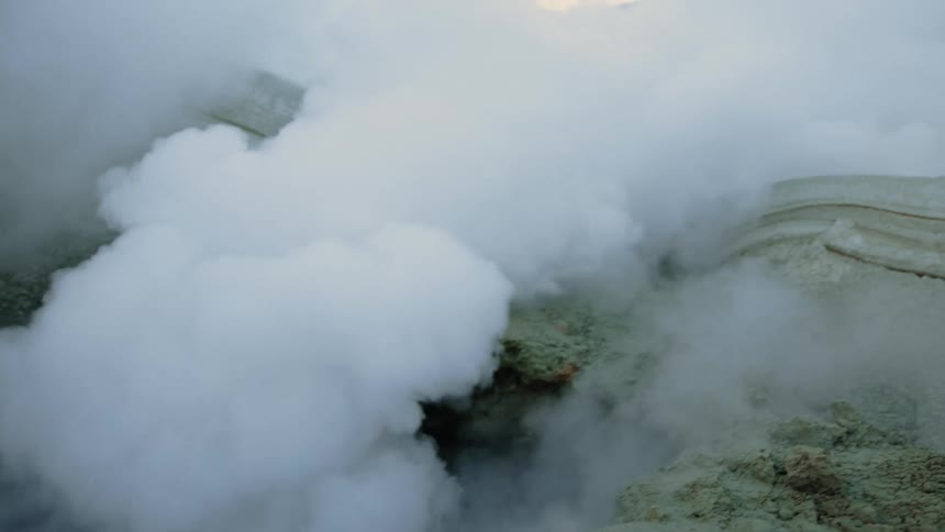 A geyser lets out clouds of steam